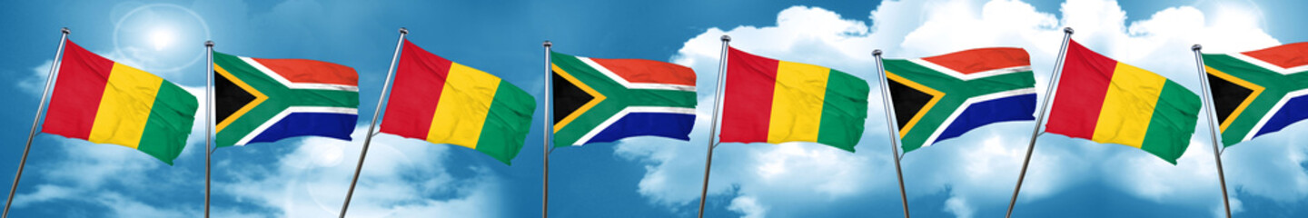 Guinea flag with South Africa flag, 3D rendering