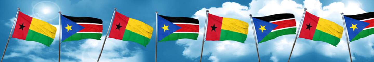 Guinea bissau flag with South Sudan flag, 3D rendering