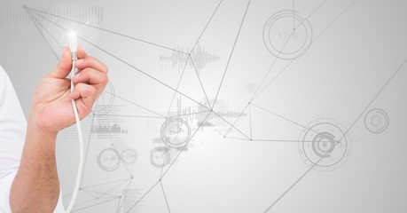 Hand of man holding cable with flare