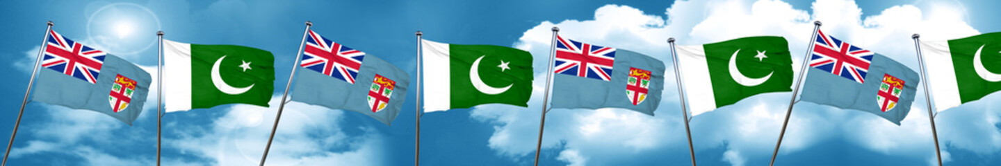 Fiji flag with Pakistan flag, 3D rendering