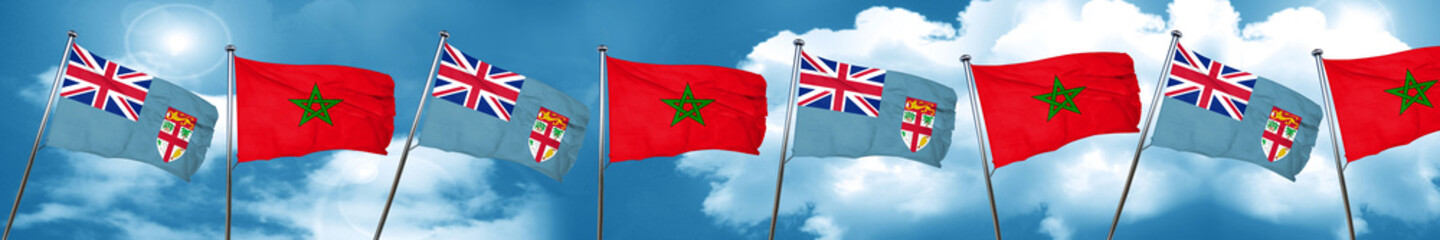 Naklejka premium Fiji flag with Morocco flag, 3D rendering
