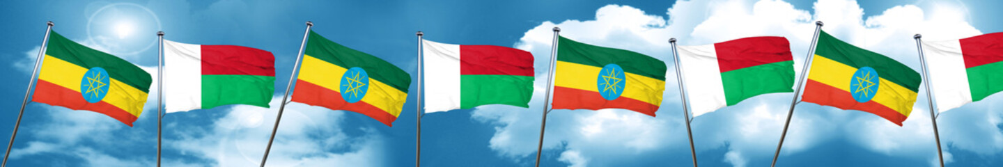 Ethiopia flag with Madagascar flag, 3D rendering
