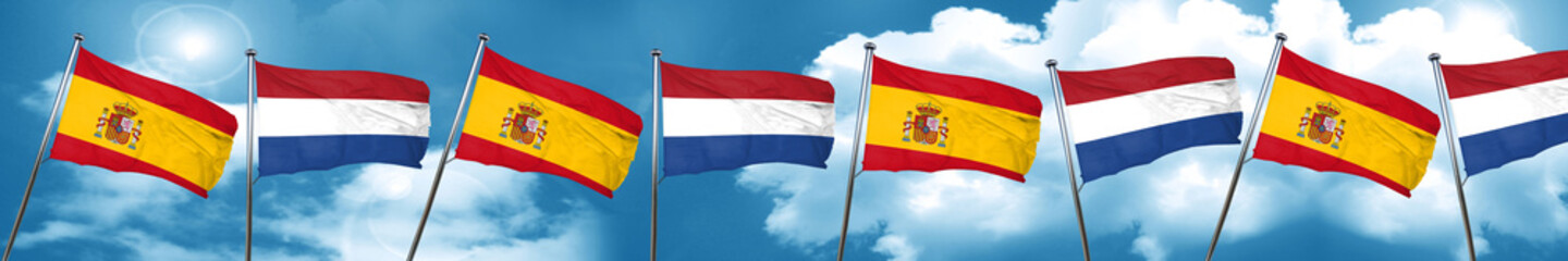 Spanish flag with Netherlands flag, 3D rendering