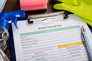 High Angle View Of Weekly Cleaning Plan Form