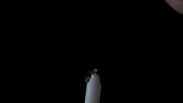 Candle Flame Blowing Out and Being Re-lit
