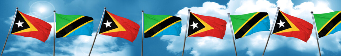 east timor flag with Tanzania flag, 3D rendering