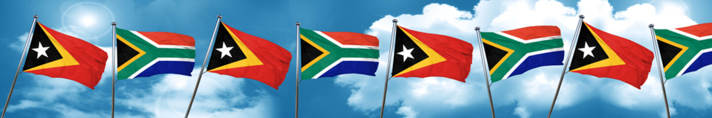 Fototapeta na wymiar east timor flag with South Africa flag, 3D rendering