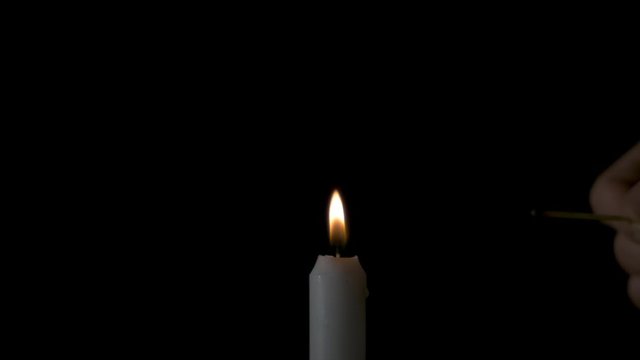 Lighting a Match from a Candle Flame Slo-Mo