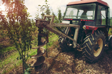 Excavator in the vineyard