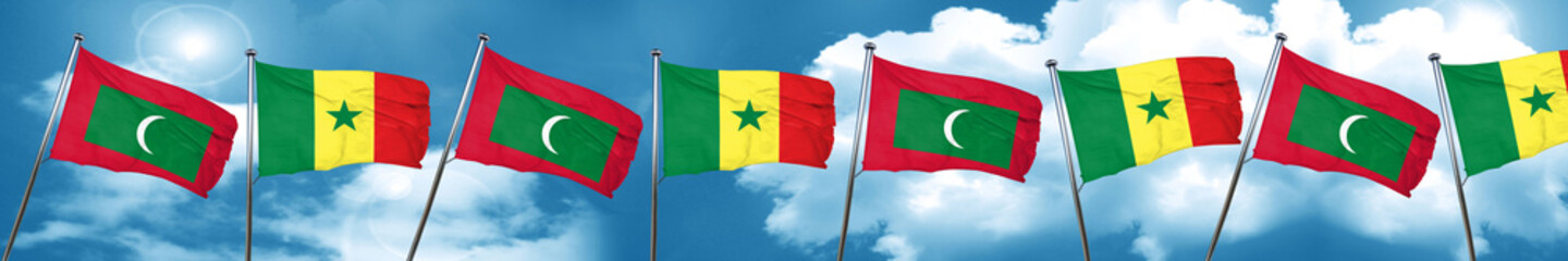 Fototapeta na wymiar Maldives flag with Senegal flag, 3D rendering