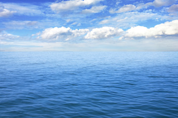 Beautiful seascape under blue sky with clouds