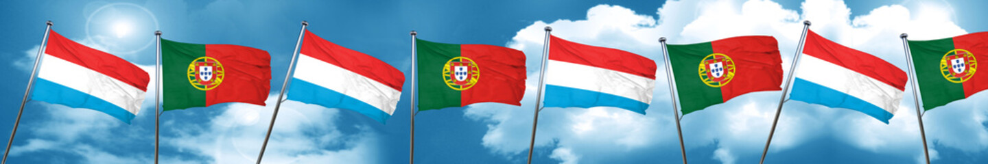 Luxembourg flag with Portugal flag, 3D rendering