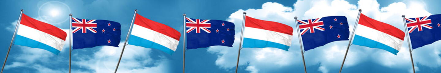 Luxembourg flag with New Zealand flag, 3D rendering