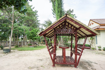 Fototapeta na wymiar wooden shelter for sitting at the seaside in the resort