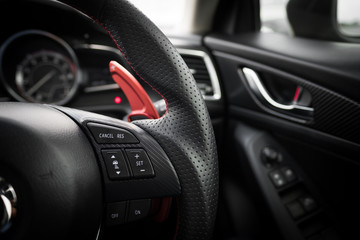 Obraz na płótnie Canvas Modern car steering wheel