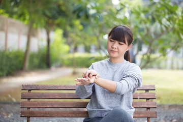 Woman scratching her skin