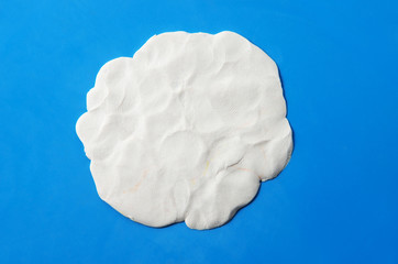 plasticine texture isolated on blue background