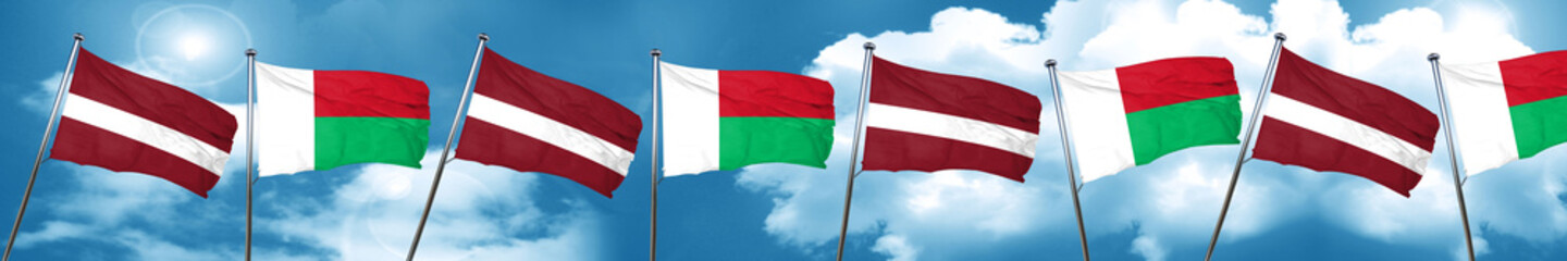 Fototapeta na wymiar Latvia flag with Madagascar flag, 3D rendering