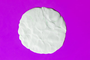 plasticine texture isolated on pink background