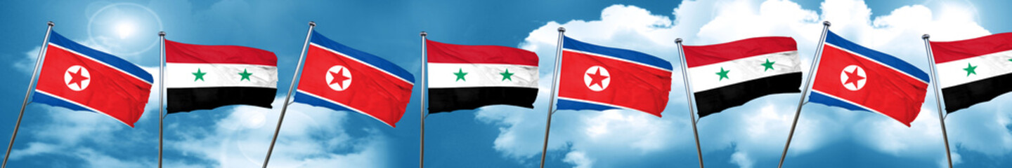 North Korea flag with Syria flag, 3D rendering