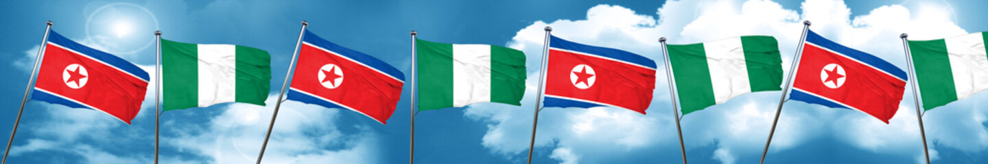 North Korea flag with Nigeria flag, 3D rendering