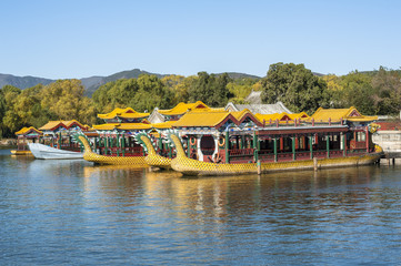 Fototapeta na wymiar Dragon boats parked in Kunming lake, Summer Palace of Beijing