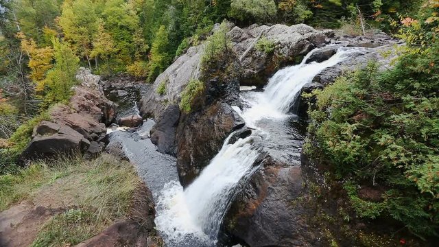 Gabbro Falls is a tiered waterfall plunging over a basalt rock cliff on the Black River of Michigan's beautiful western Upper Peninsula.