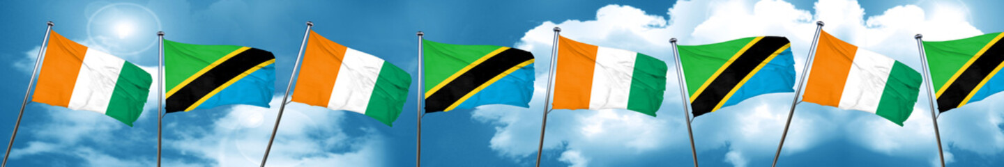 Ivory coast flag with Tanzania flag, 3D rendering