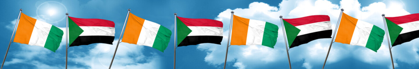 Ivory coast flag with Sudan flag, 3D rendering