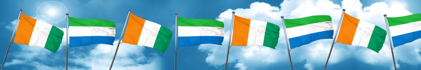 Ivory coast flag with Sierra Leone flag, 3D rendering