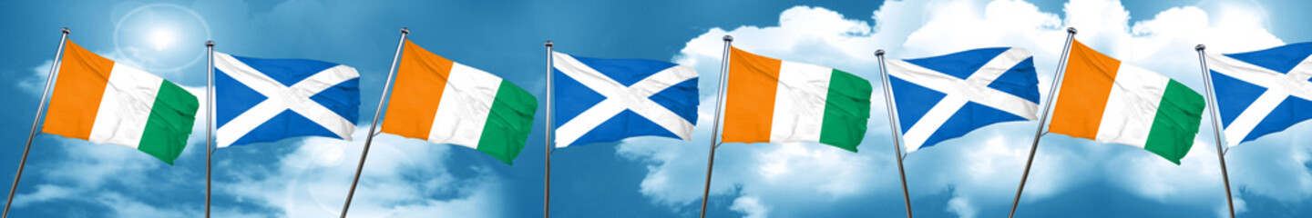 Fototapeta na wymiar Ivory coast flag with Scotland flag, 3D rendering