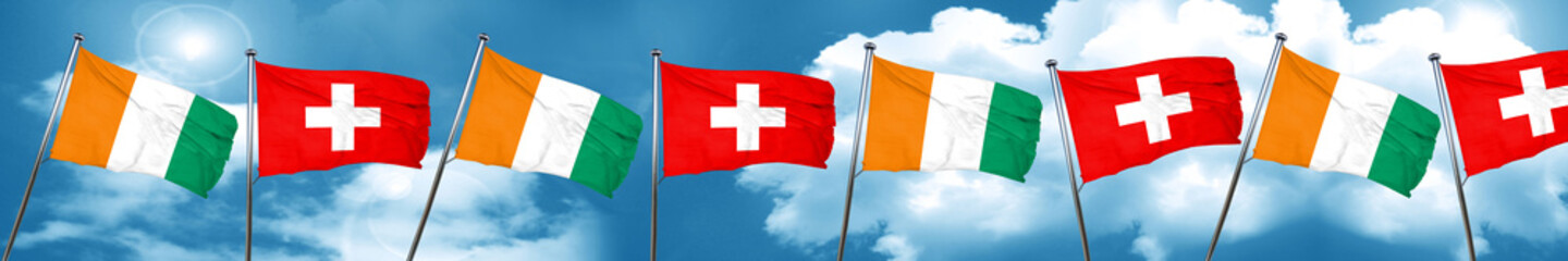 Ivory coast flag with Switzerland flag, 3D rendering