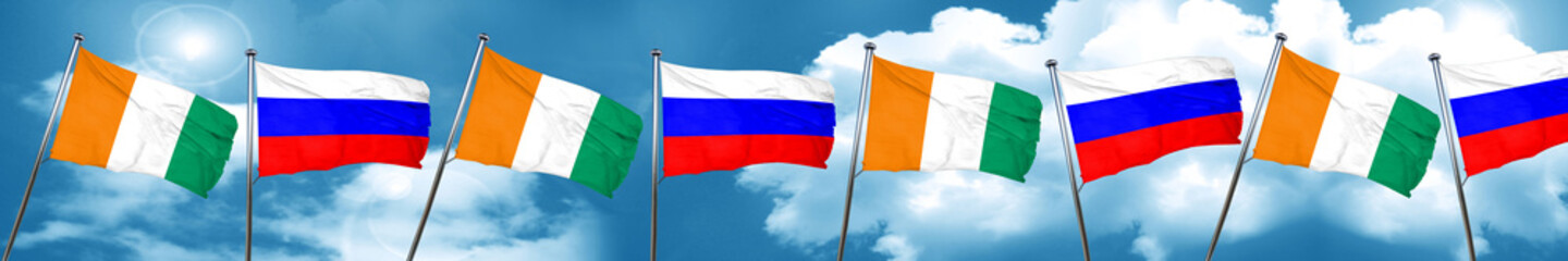 Ivory coast flag with Russia flag, 3D rendering
