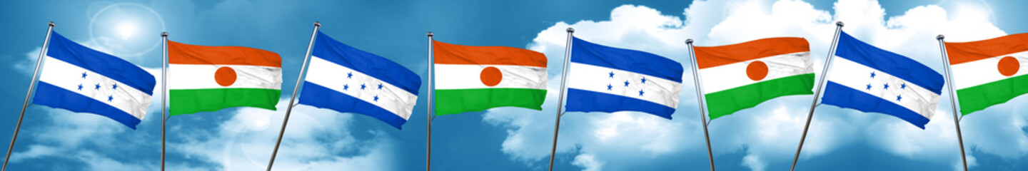 Honduras flag with Niger flag, 3D rendering