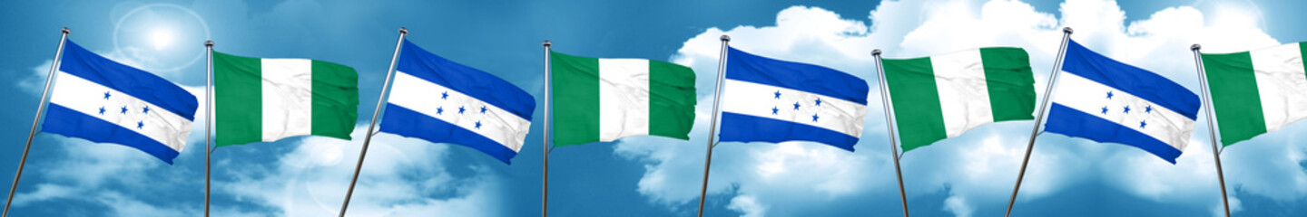 Honduras flag with Nigeria flag, 3D rendering