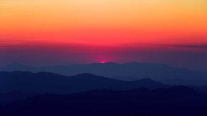 Scenic view of sunset over the mountains