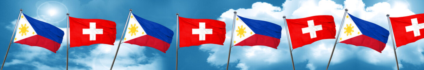 Philippines flag with Switzerland flag, 3D rendering