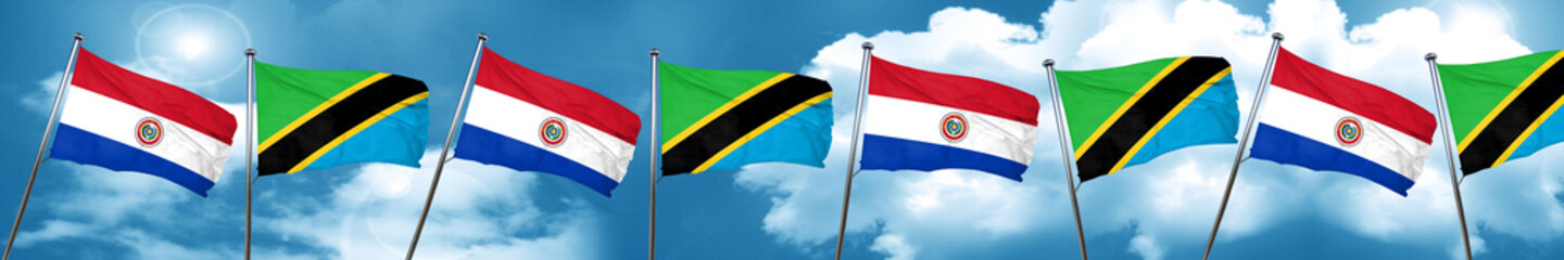Paraguay flag with Tanzania flag, 3D rendering