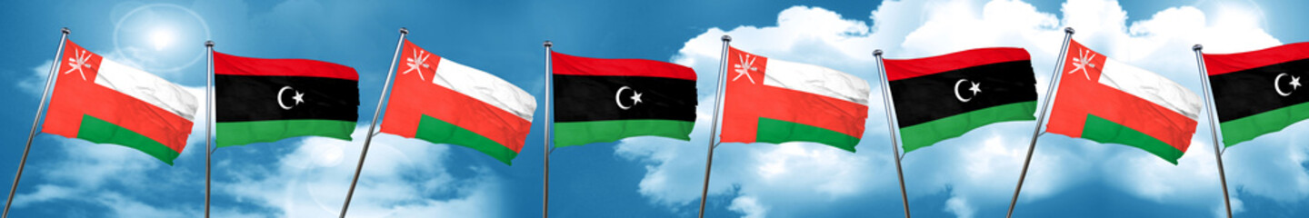 Oman flag with Libya flag, 3D rendering