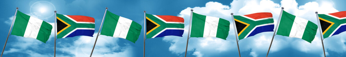 Naklejka na ściany i meble Nigeria flag with South Africa flag, 3D rendering
