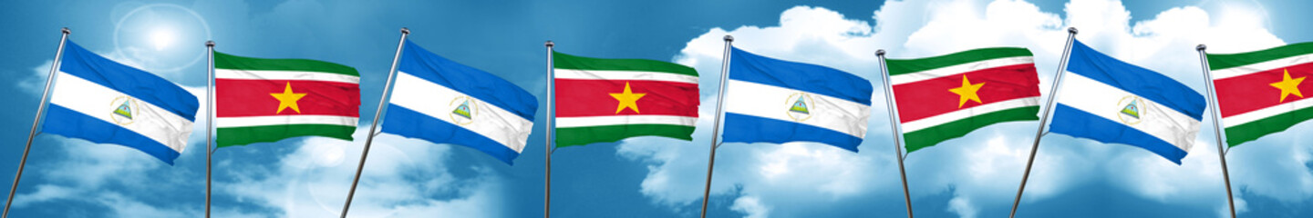 nicaragua flag with Suriname flag, 3D rendering