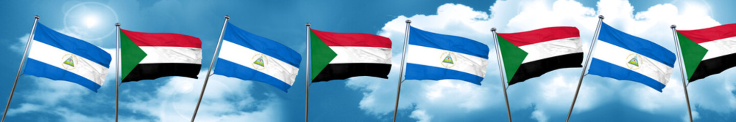 nicaragua flag with Sudan flag, 3D rendering