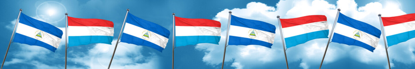 nicaragua flag with Luxembourg flag, 3D rendering