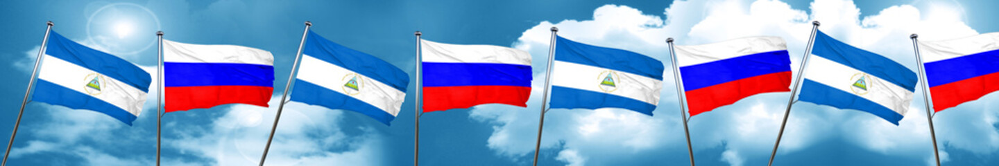 nicaragua flag with Russia flag, 3D rendering