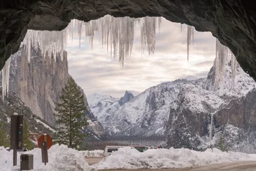 Tuinposter Icicles hanging from the tunnel at the entrance to Yosemite Valley after a winter storm © david