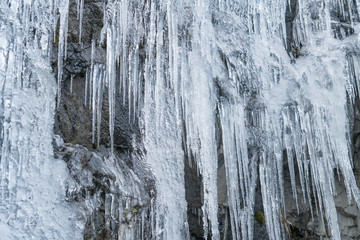 Fototapeta na wymiar Massive Icicles hanging from the ceiling of the Tunnel leadimng into Yosemite Valley