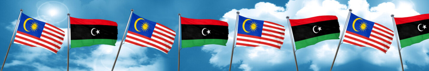 Malaysia flag with Libya flag, 3D rendering