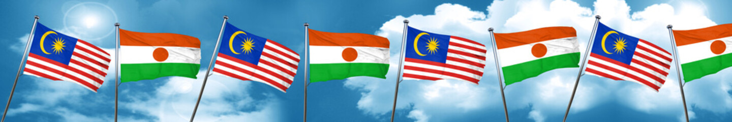 Malaysia flag with Niger flag, 3D rendering