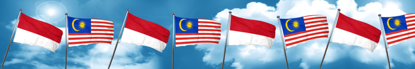 monaco flag with Malaysia flag, 3D rendering