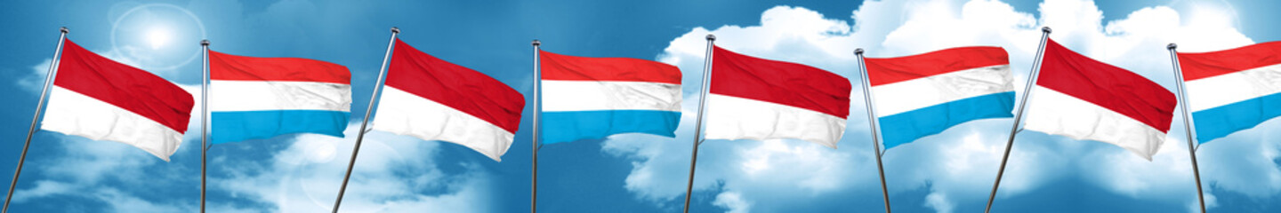 monaco flag with Luxembourg flag, 3D rendering